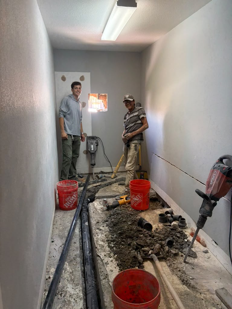 Carlito's crew installing new drain lines under a concrete slab in Las Vegas
