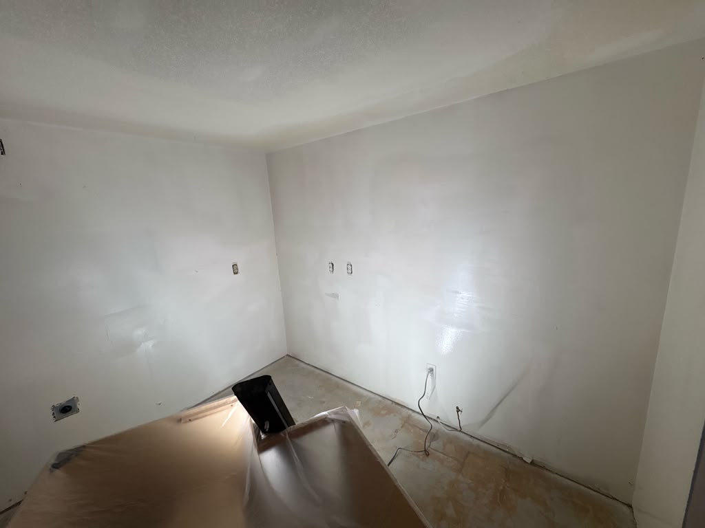 Kitchen walls skimmed smooth and primed, ready for paint in Las Vegas